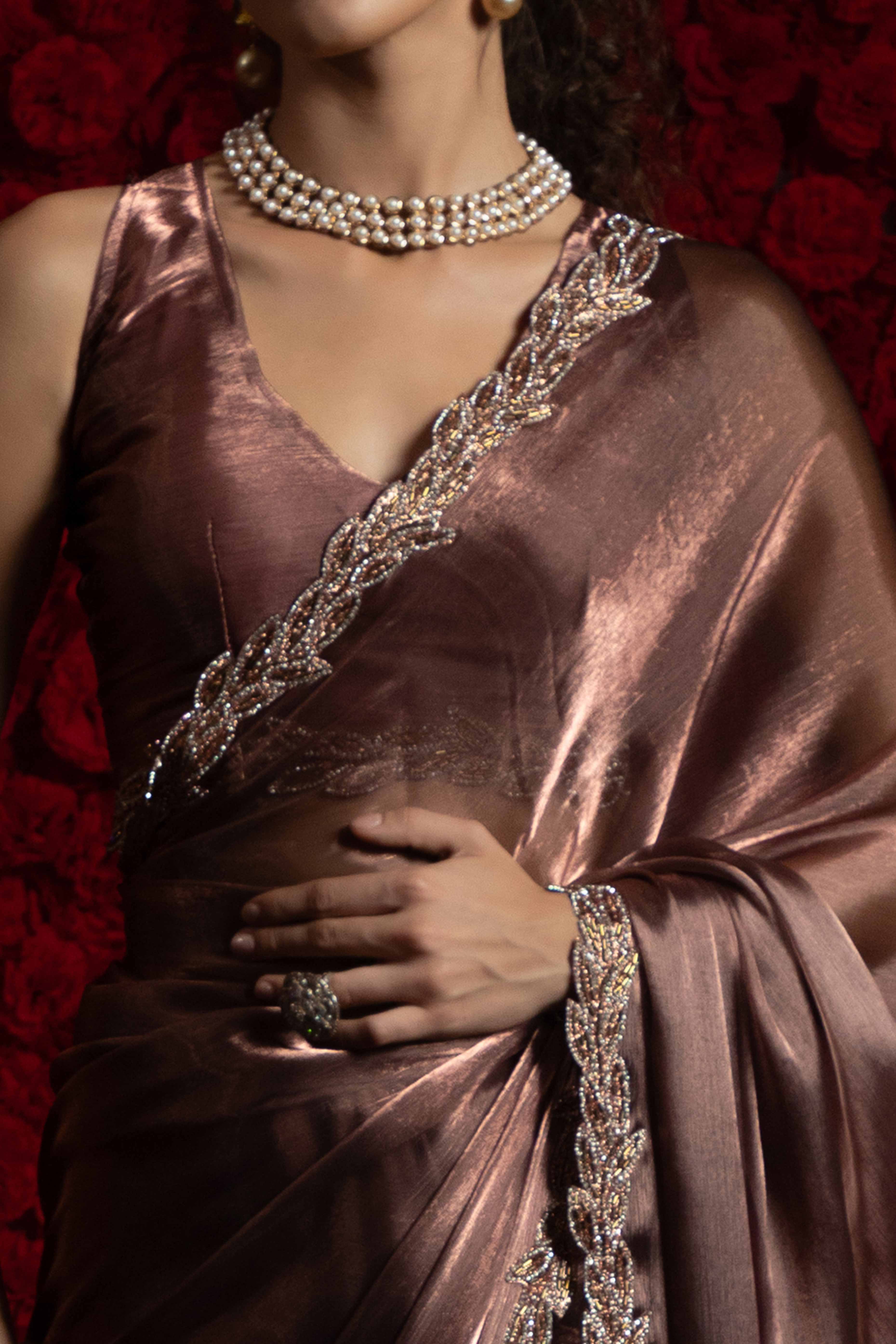 Dusty Rose Brown Solid Tissue Chiffon Saree Accented With Elegant Zarkan Work Border