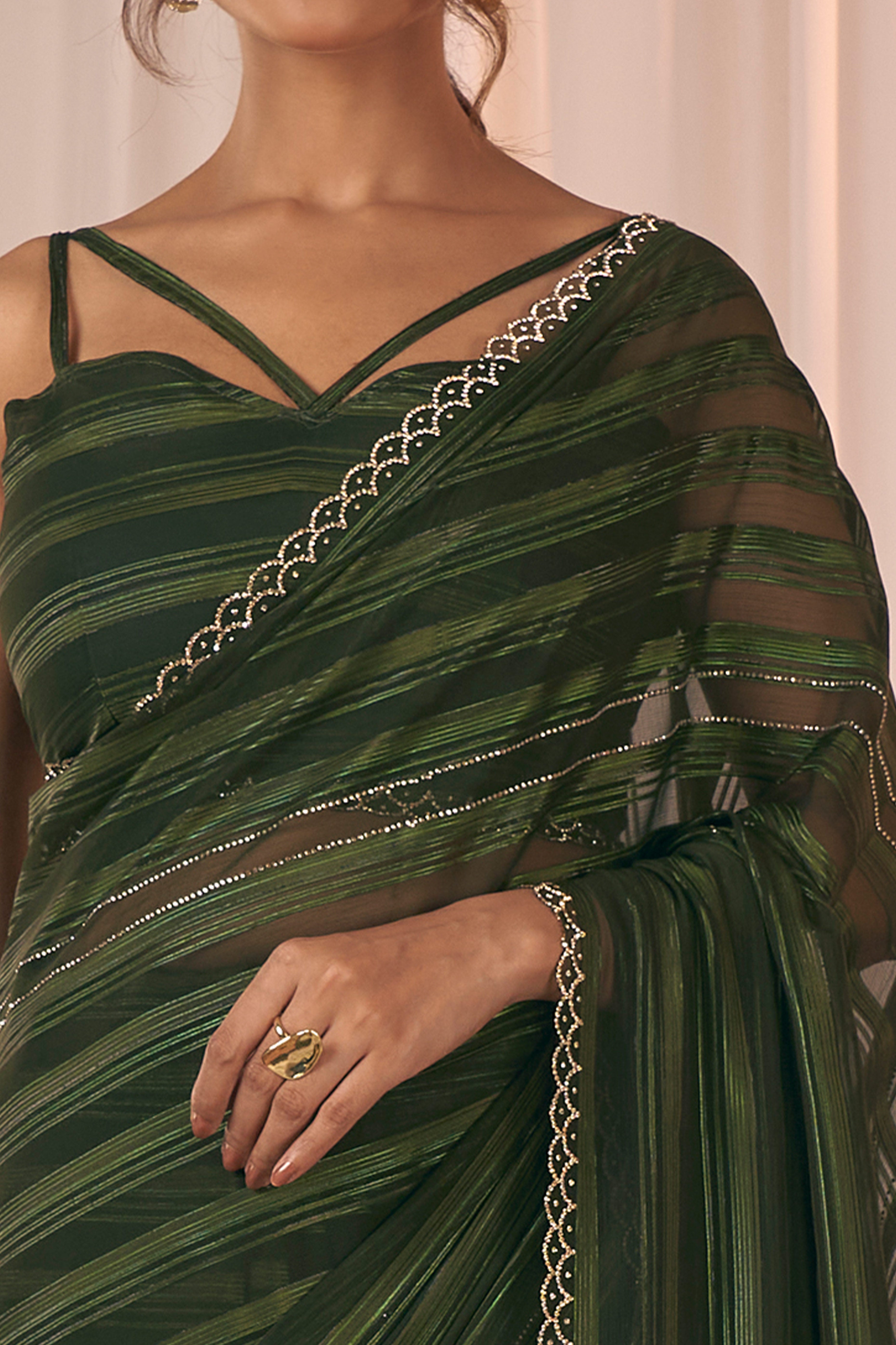 Dark Olive Striped Designer Georgette Saree Adorned With An Elegant Zarkan Cutwork Border
