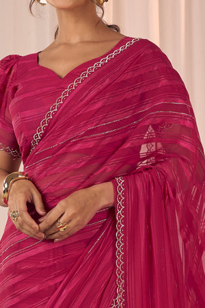 Rose pink Striped Designer Georgette Saree Adorned With An Elegant Zarkan Cutwork Border