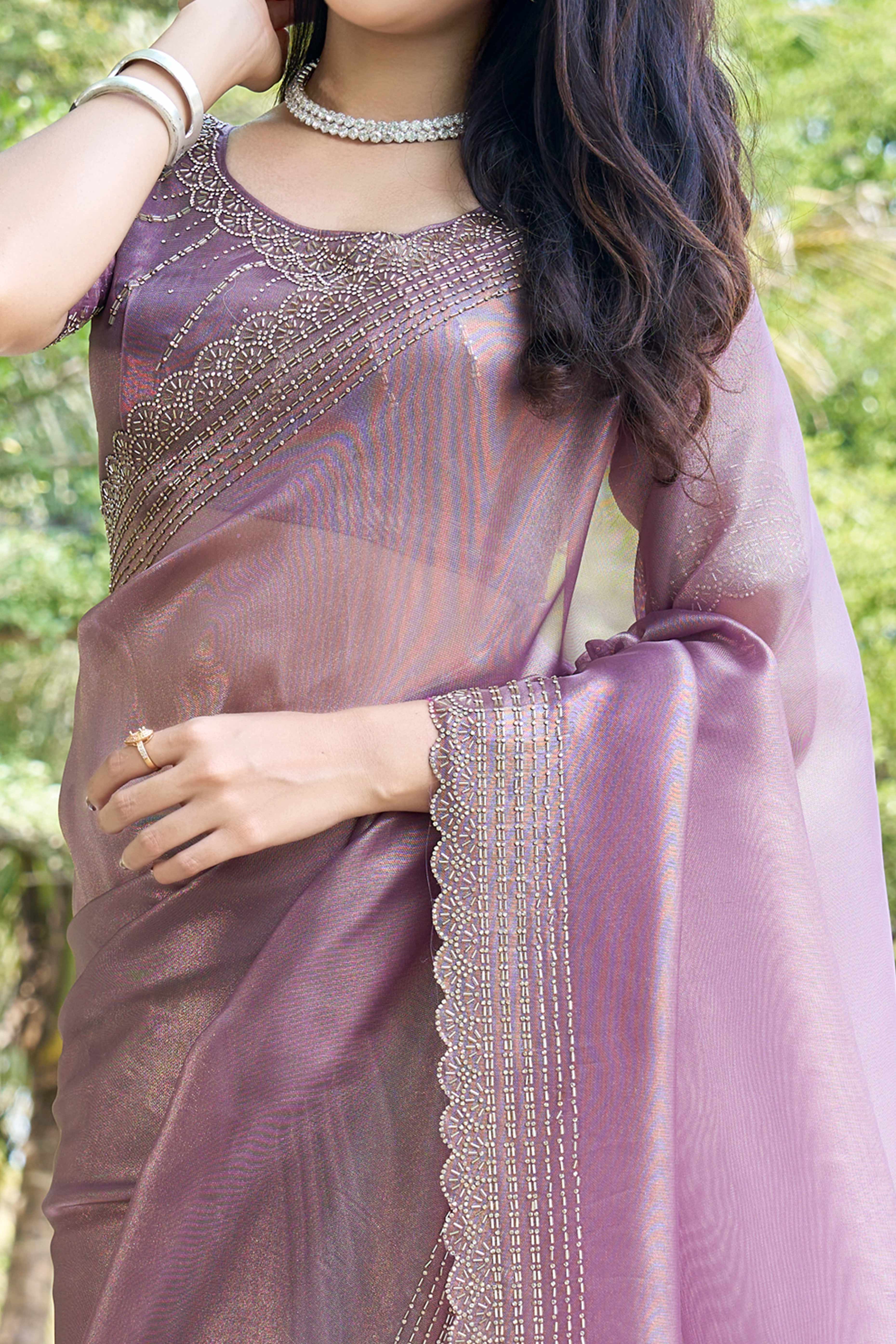 Pastel Purple Soft Organza Saree with Stone Embellishments Work
