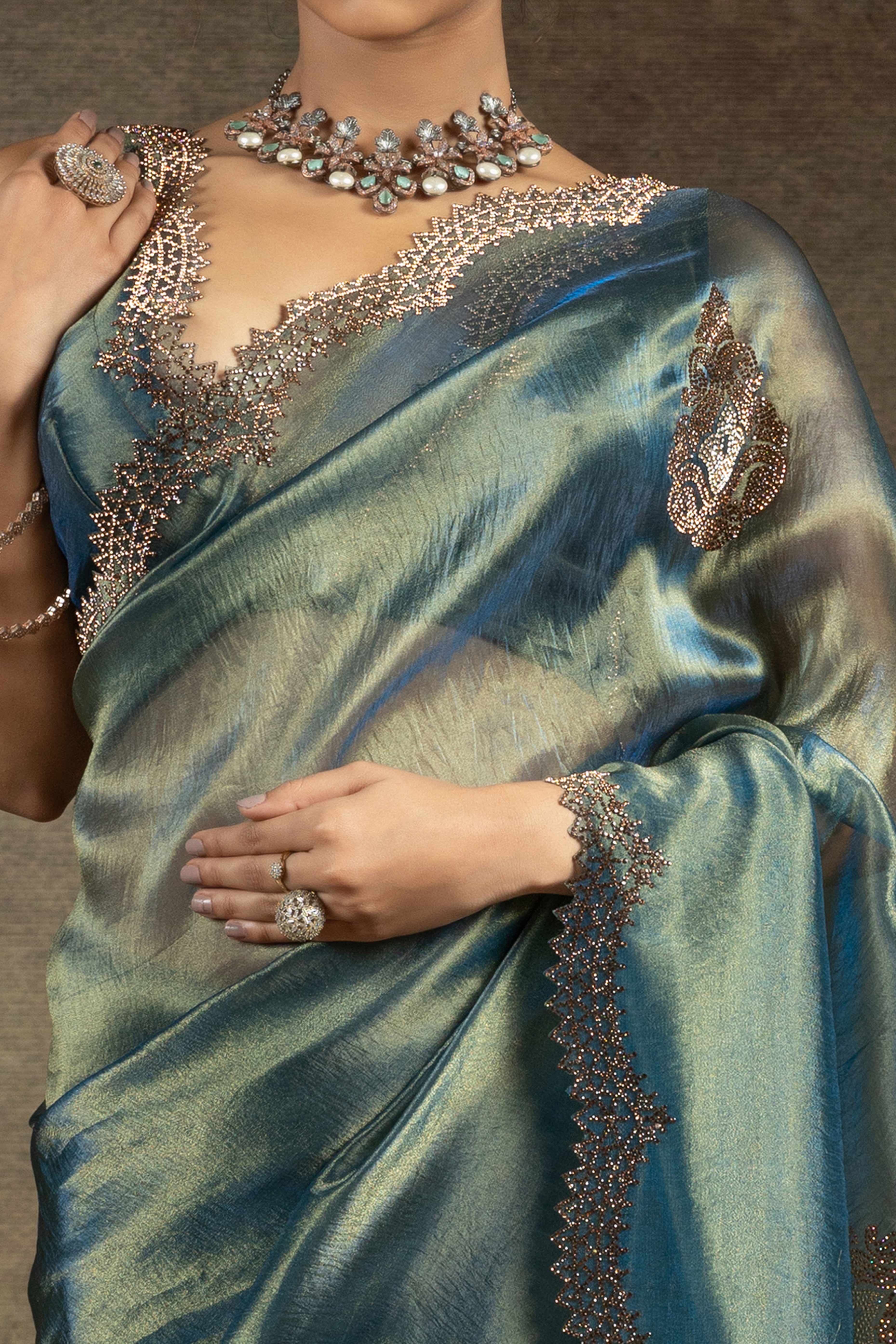 Teal Banarasi Silk Saree with Stone Embellishments Perfect for Party Wear