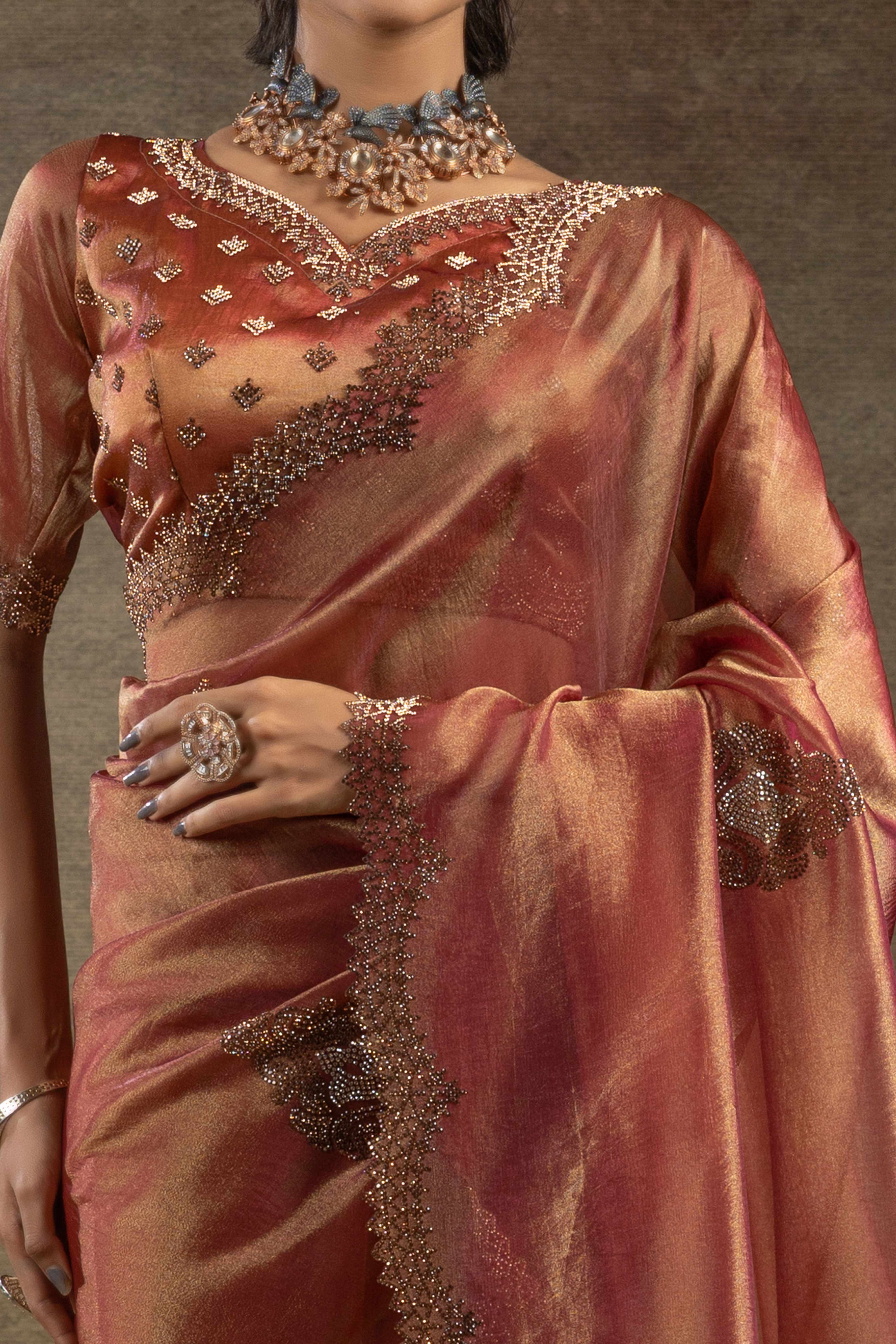 Peach Banarasi Silk Saree with Stone Embellishments Perfect for Party Wear