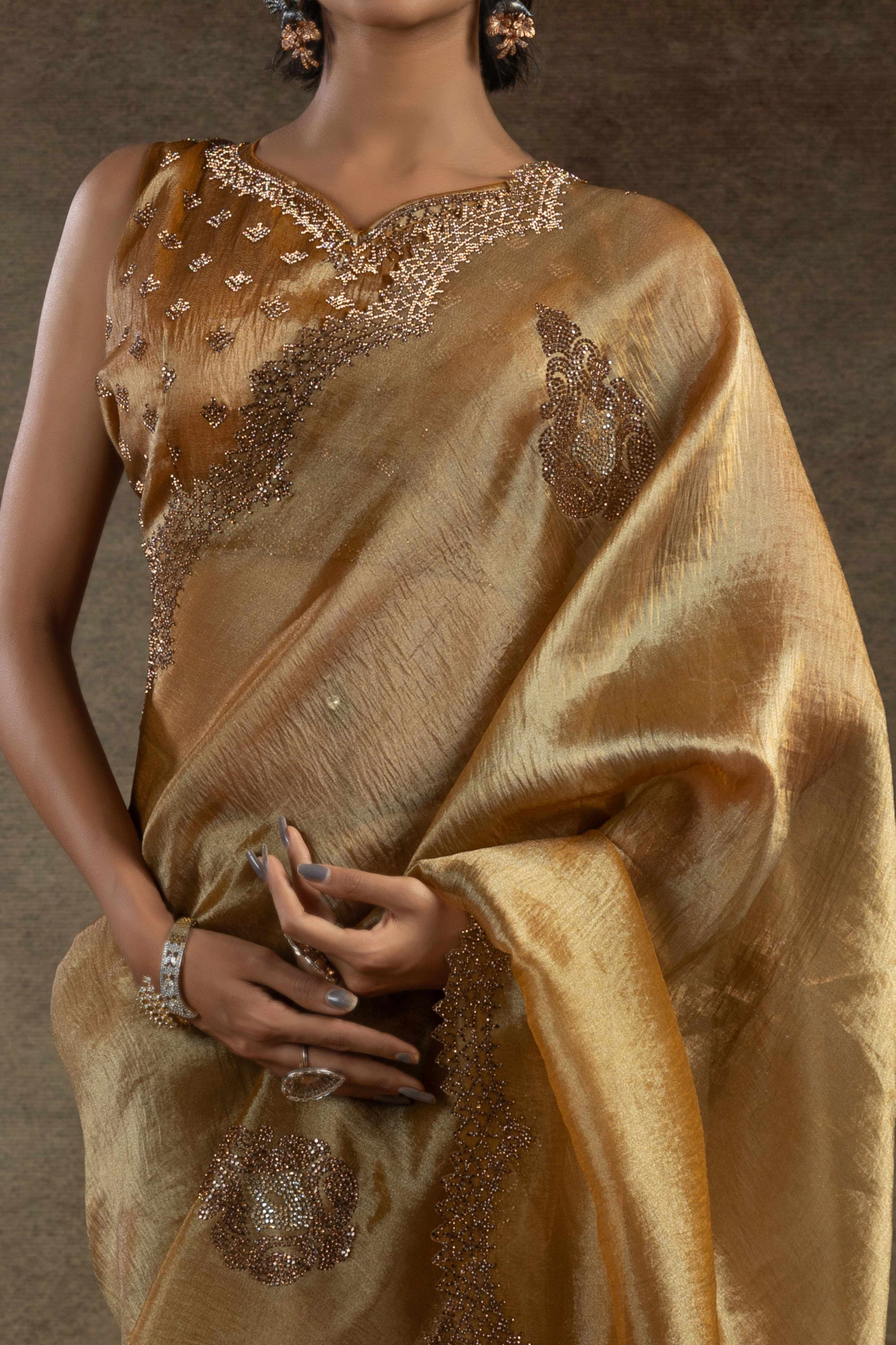 Gold Banarasi Silk Saree with Stone Embellishments Perfect for Party Wear