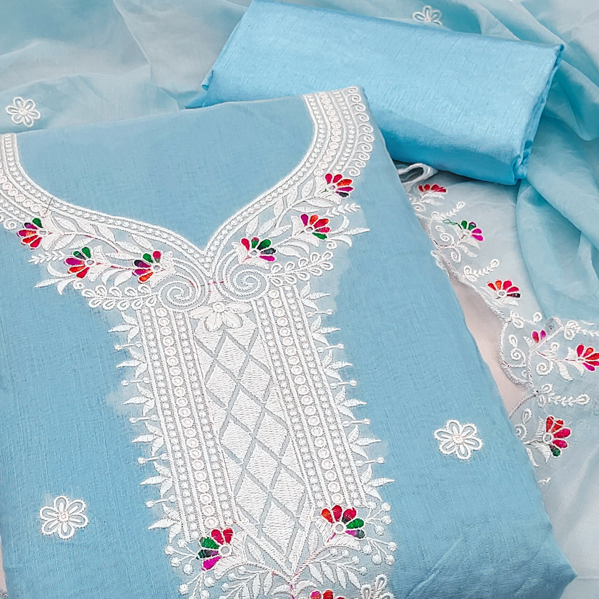 Sky Blue Cambric Cotton Dress Material With Elegant Floral Embroidery Work