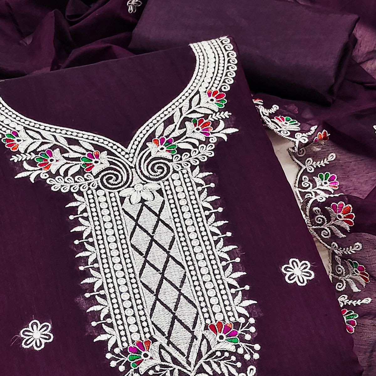 Wine Cambric Cotton Dress Material With Elegant Floral Embroidery Work