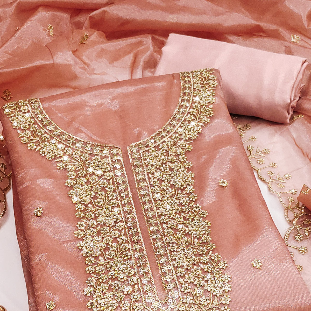 Peach Designer Suit Material in Sheer Twill Net with Thread Embroidered Patterns