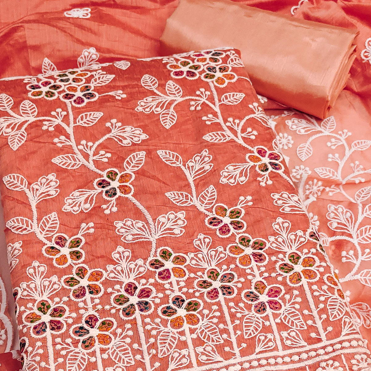 Orange Chanderi Cotton Dress Material Adorned With Elegant Floral Thread Embroidery Work