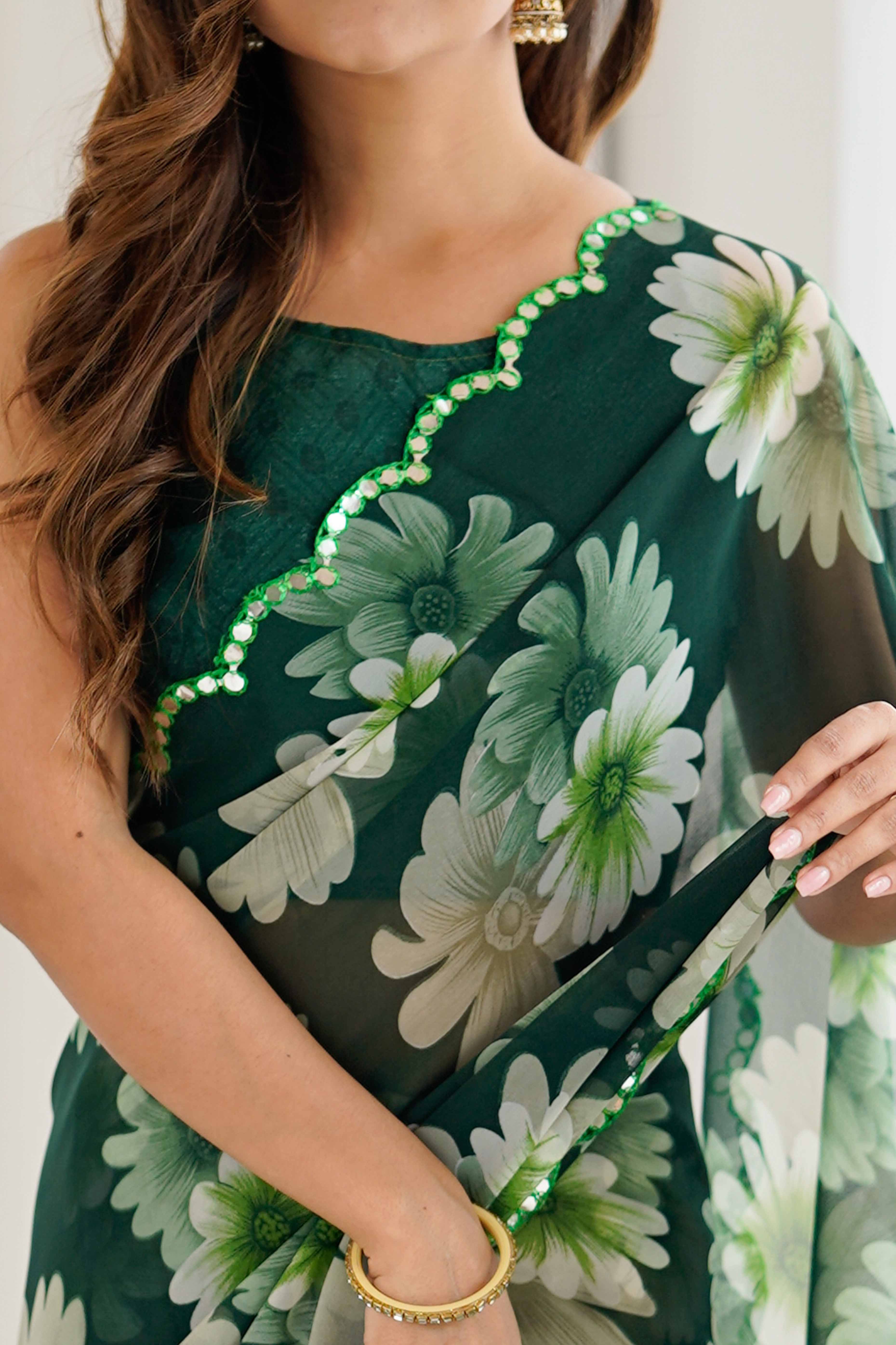 Green Georgette Saree Featuring Floral Prints & Shimmering Mirror Work Border