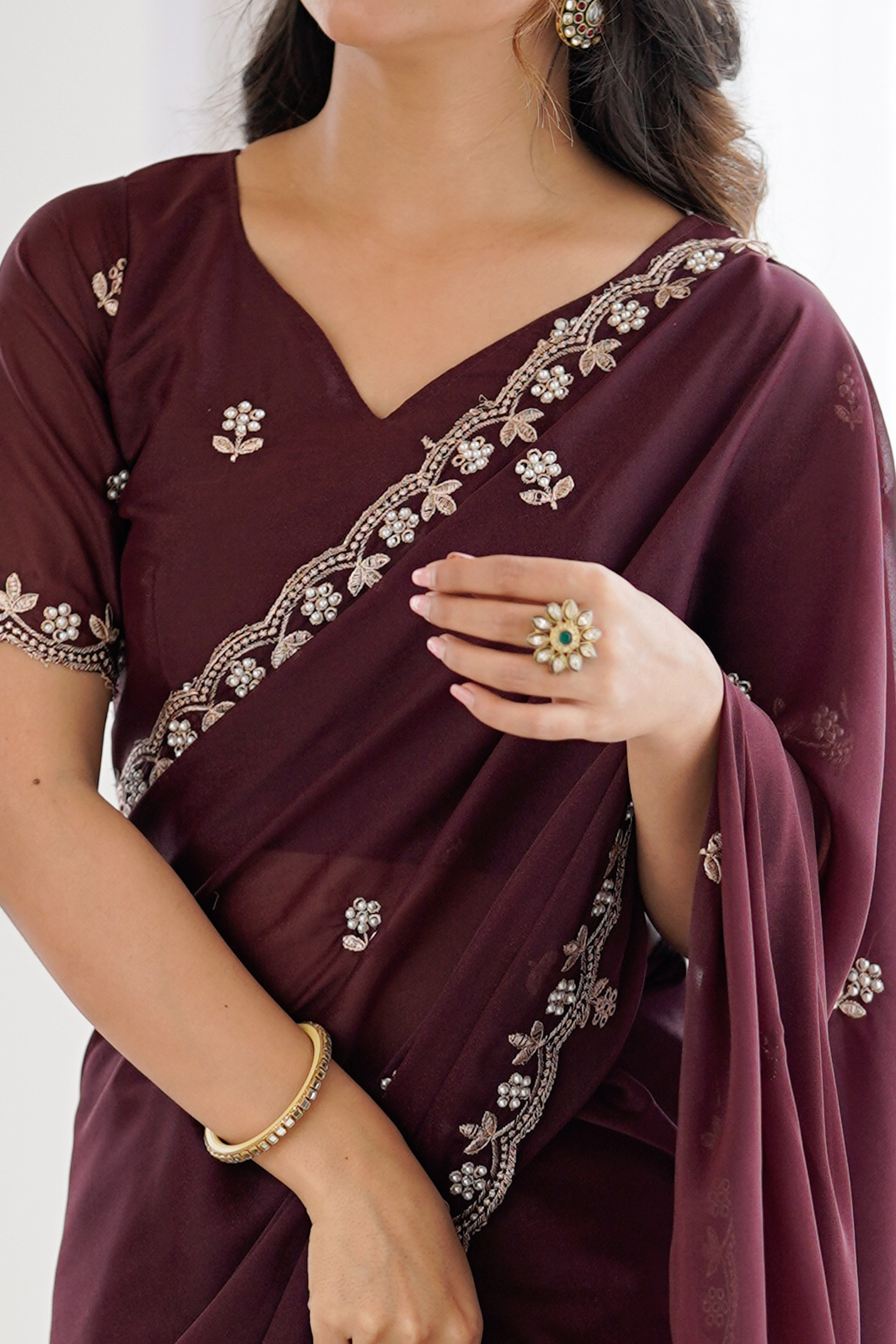 Brown Partywear Star Georgette Saree Adorned with Floral Embroidery and Beads Work