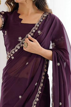 Wine Partywear Star Georgette Saree Adorned with Floral Embroidery and Beads Work