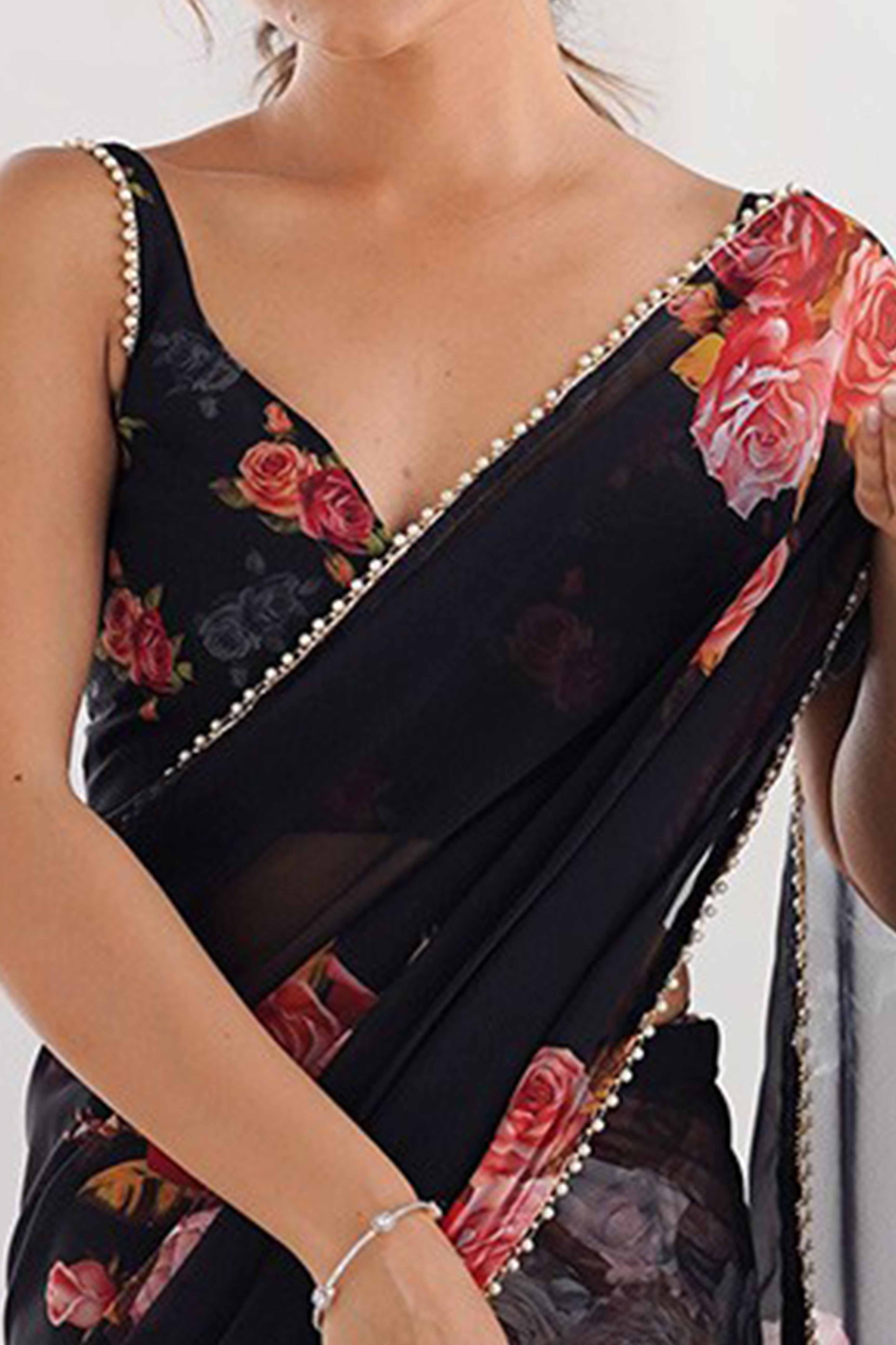 Partywear Black Georgette Saree with Floral Prints and Bead Work Lace