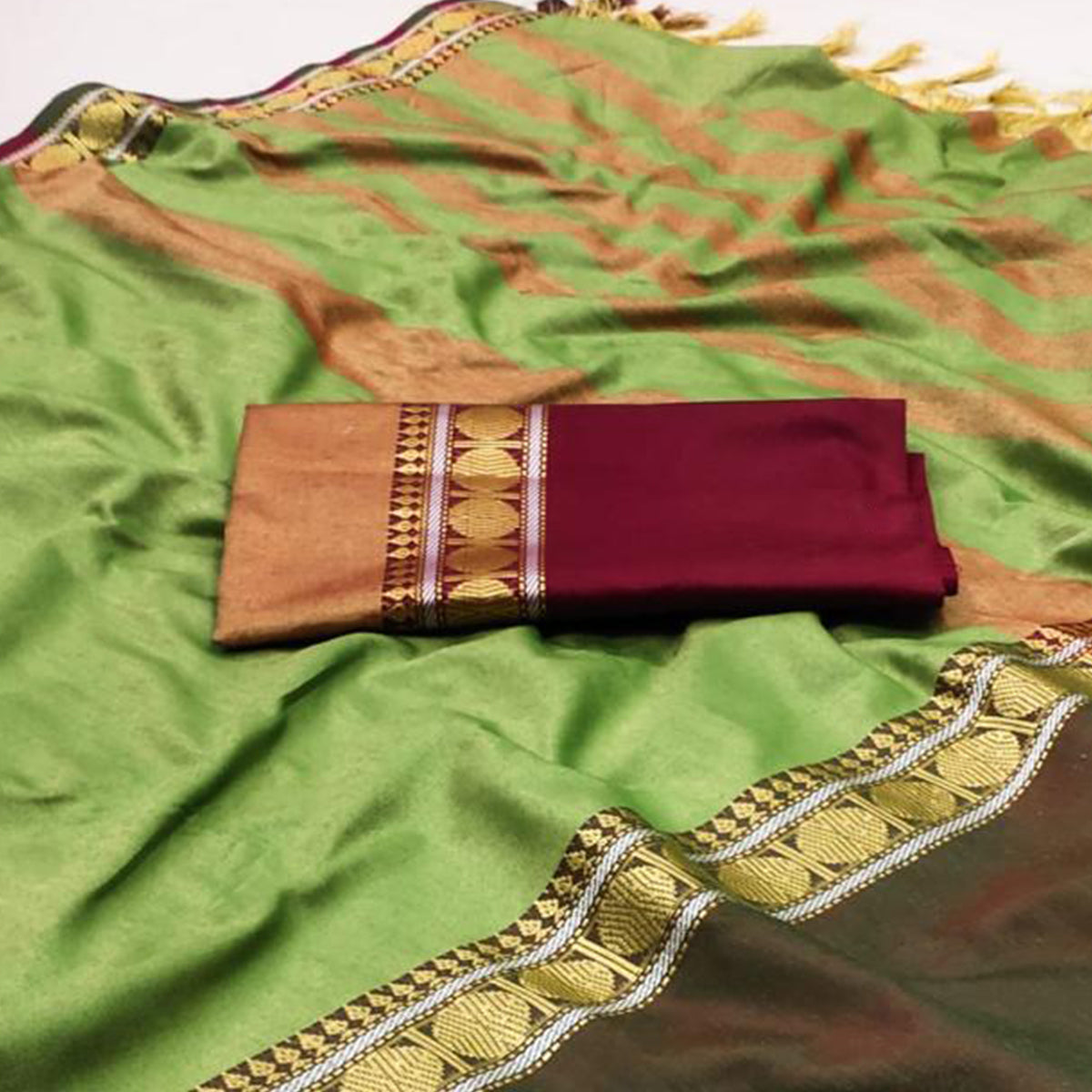 Pastle Green Woven Cotton Silk Saree With Tassels