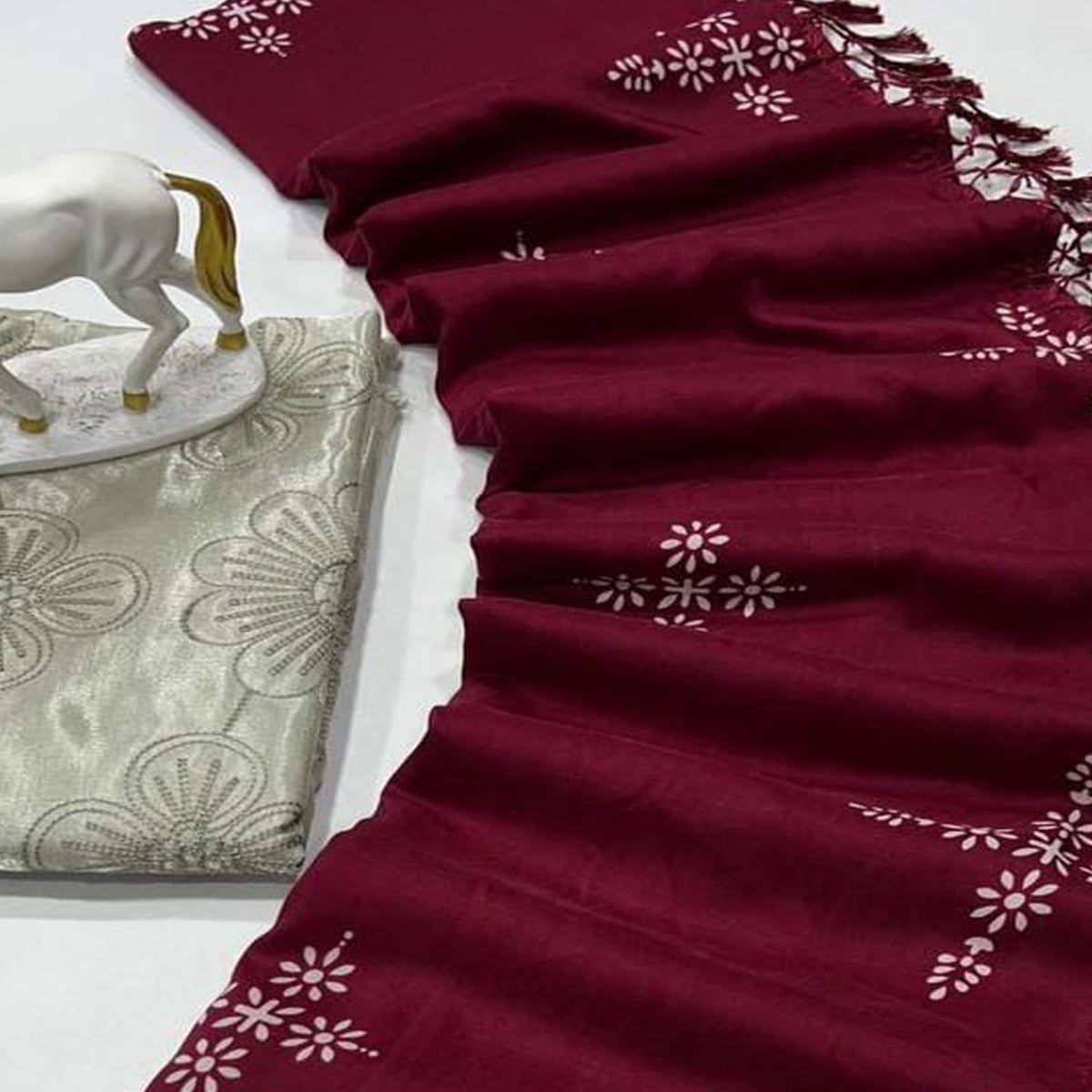 Wine Floral Printed Muslin Saree With Tassels