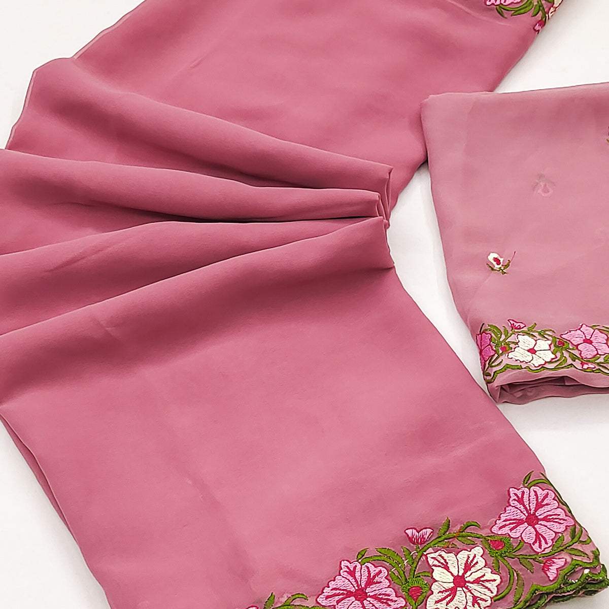 Pink Faux Georgette Saree Featuring Minimalist Floral Border Embroidery