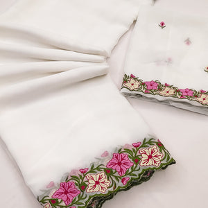 White Faux Georgette Saree Featuring Minimalist Floral Border Embroidery