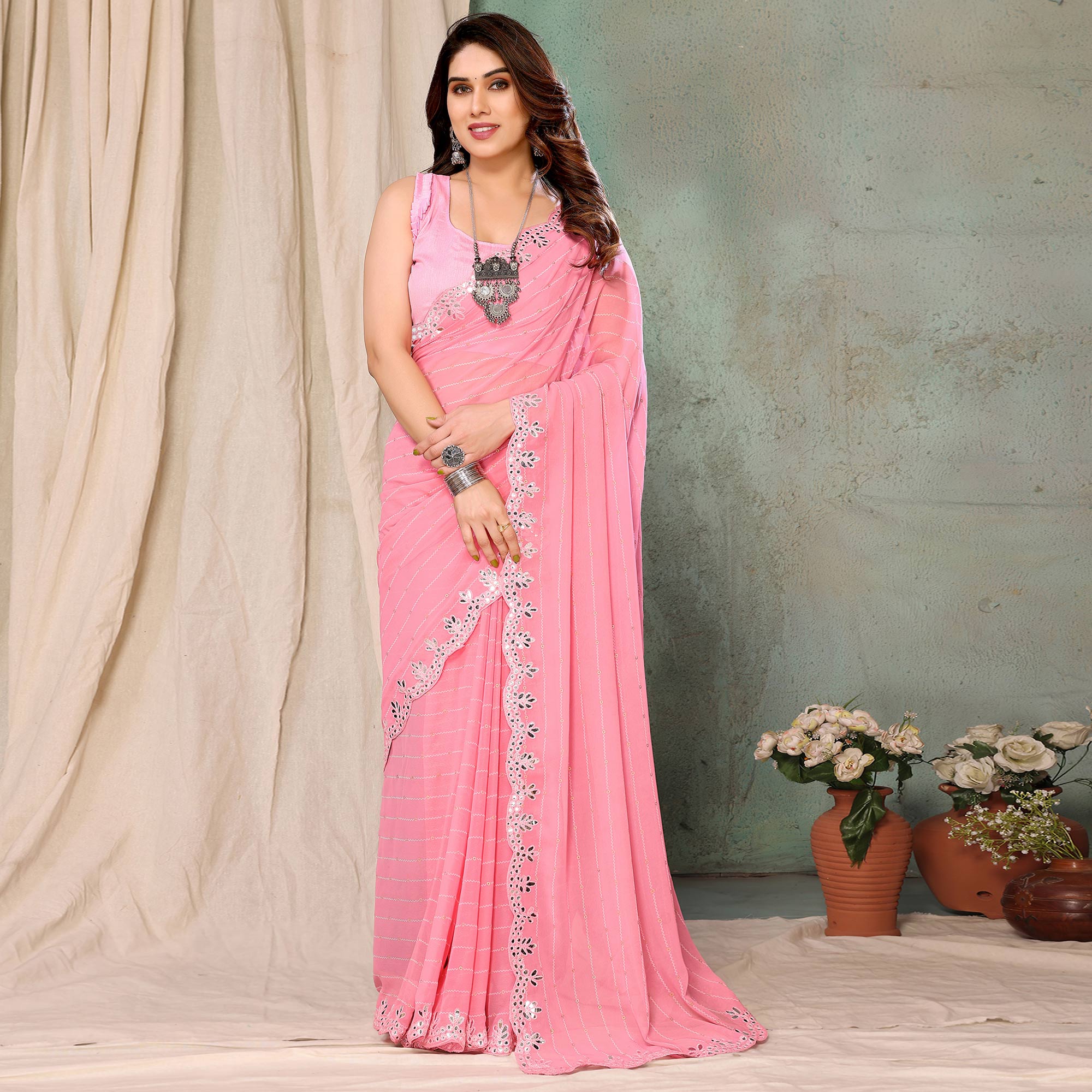 Pink Embroidered Georgette Saree With Mirror Work Border