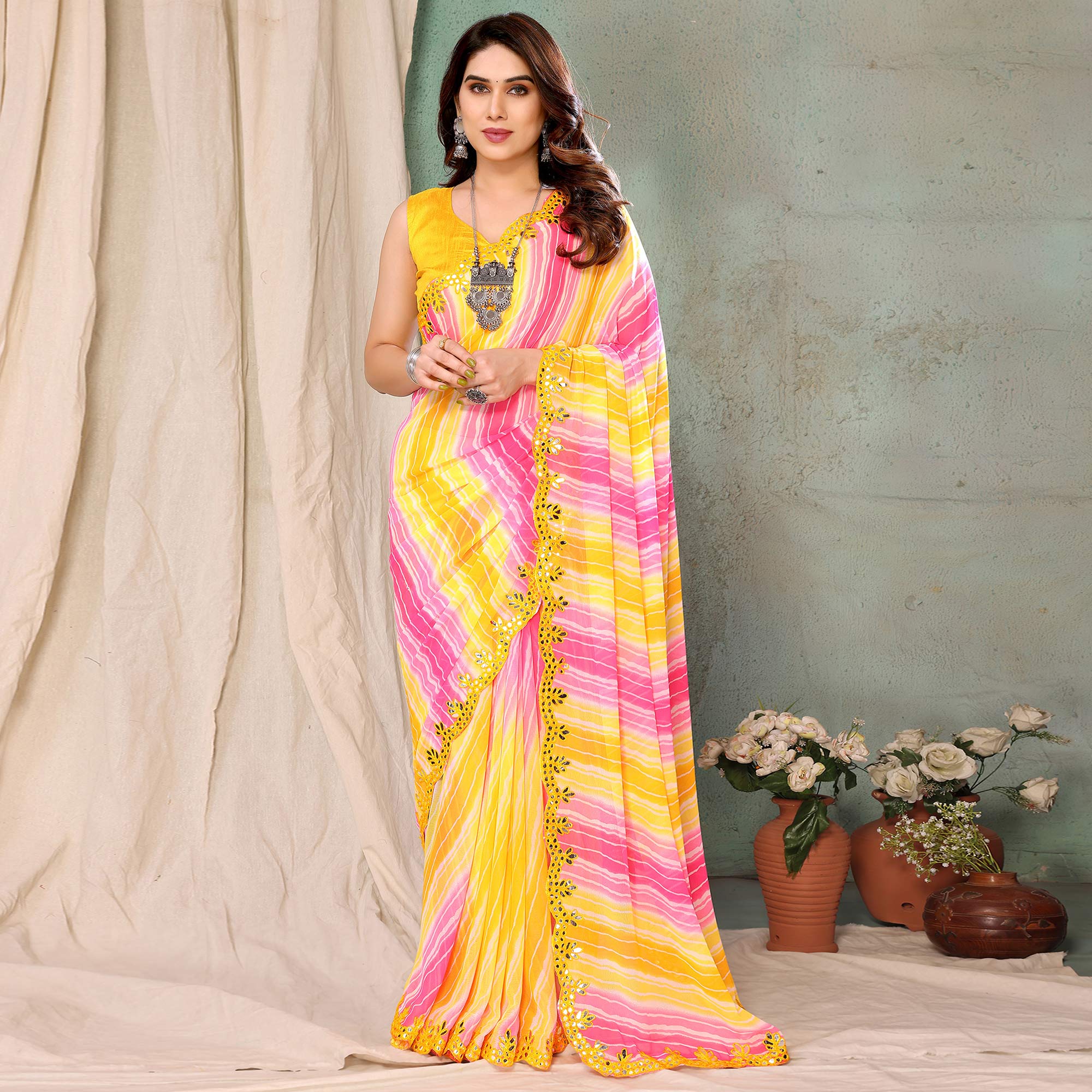 Yellow & Pink Printed Georgette Saree With Mirror Work Border