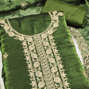 Green Satin Dress Material Featuring Exquisite Floral Embroidery With Detailed Handwork Accents