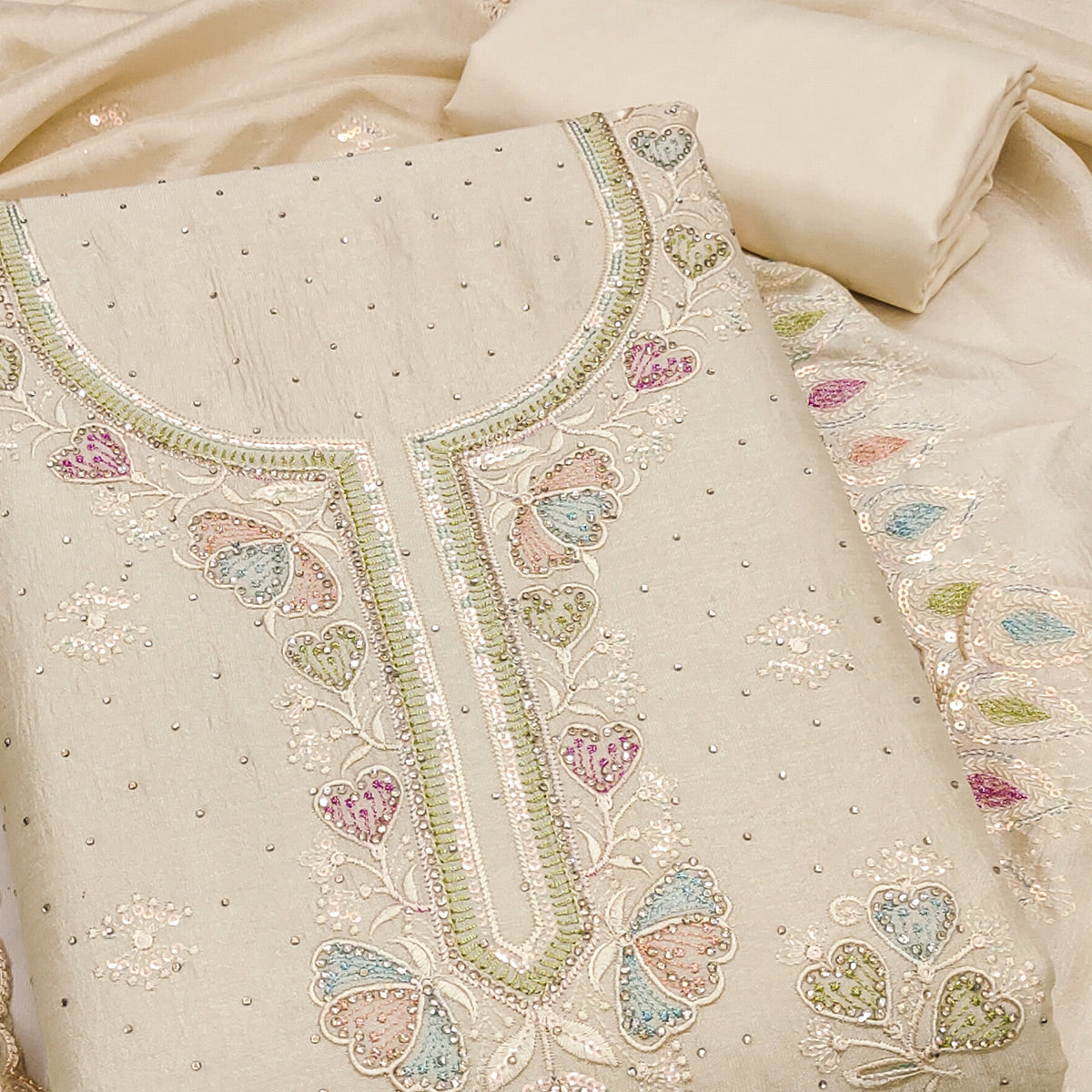 Cream Vichitra Silk Dress Material Adorned With Elegant Floral Embroidery & Sparkling Stonework