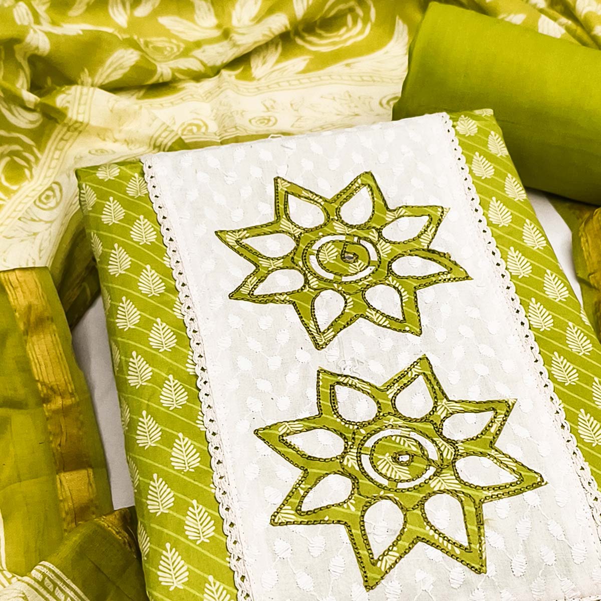 Green Leaf & Striped Printed Pure Cotton Dress Material Accented With Floral Embroidered Neckline