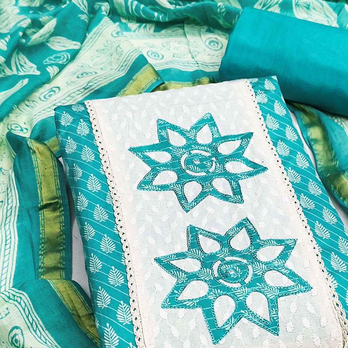 Turquoise Leaf & Striped Print Pure Cotton Dress Material Accented With Floral Embroidered Neckline