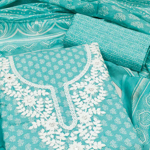 Aqua Green Pure Cotton Dress Material with Artistic Neck Embroidery and Subtle Printed Motifs