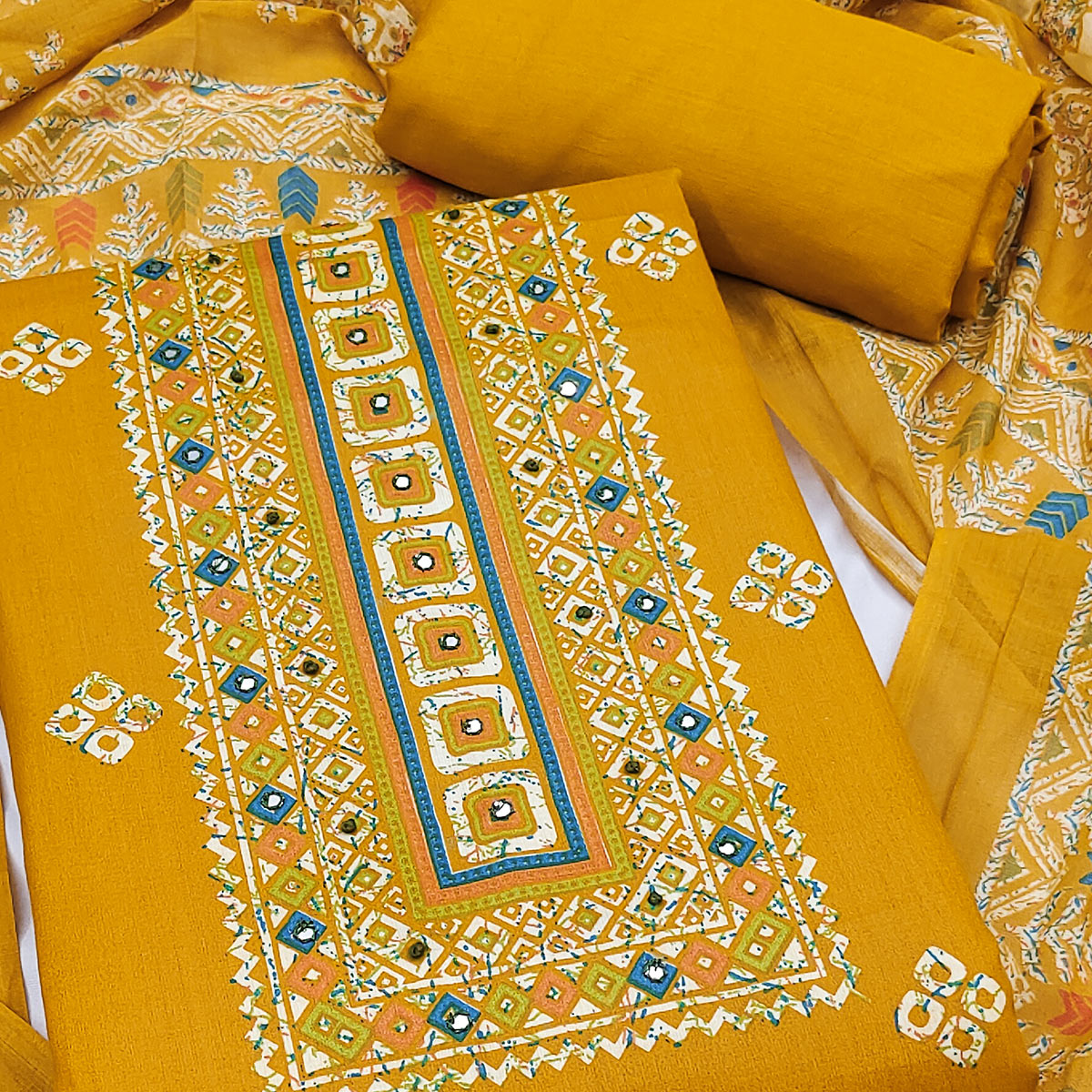 Graceful Mustard Floral Printed Pure Cotton Dress Material With Elegant Neck Embroidery Work