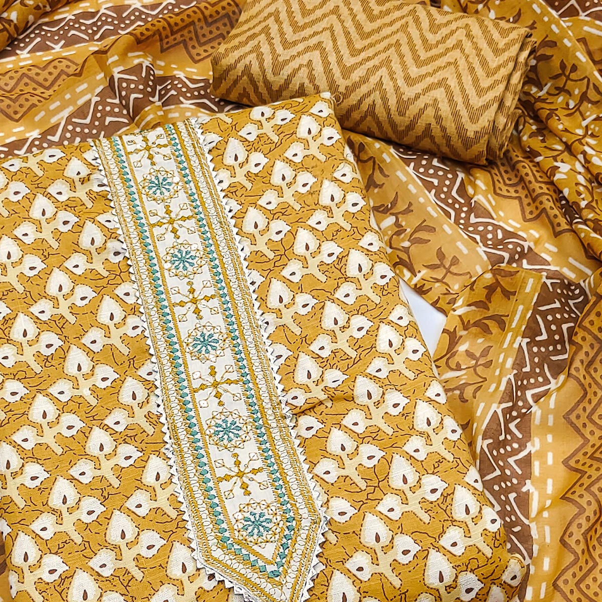 Mustard Floral Printed With Embroidered Pure Cotton Dress Material