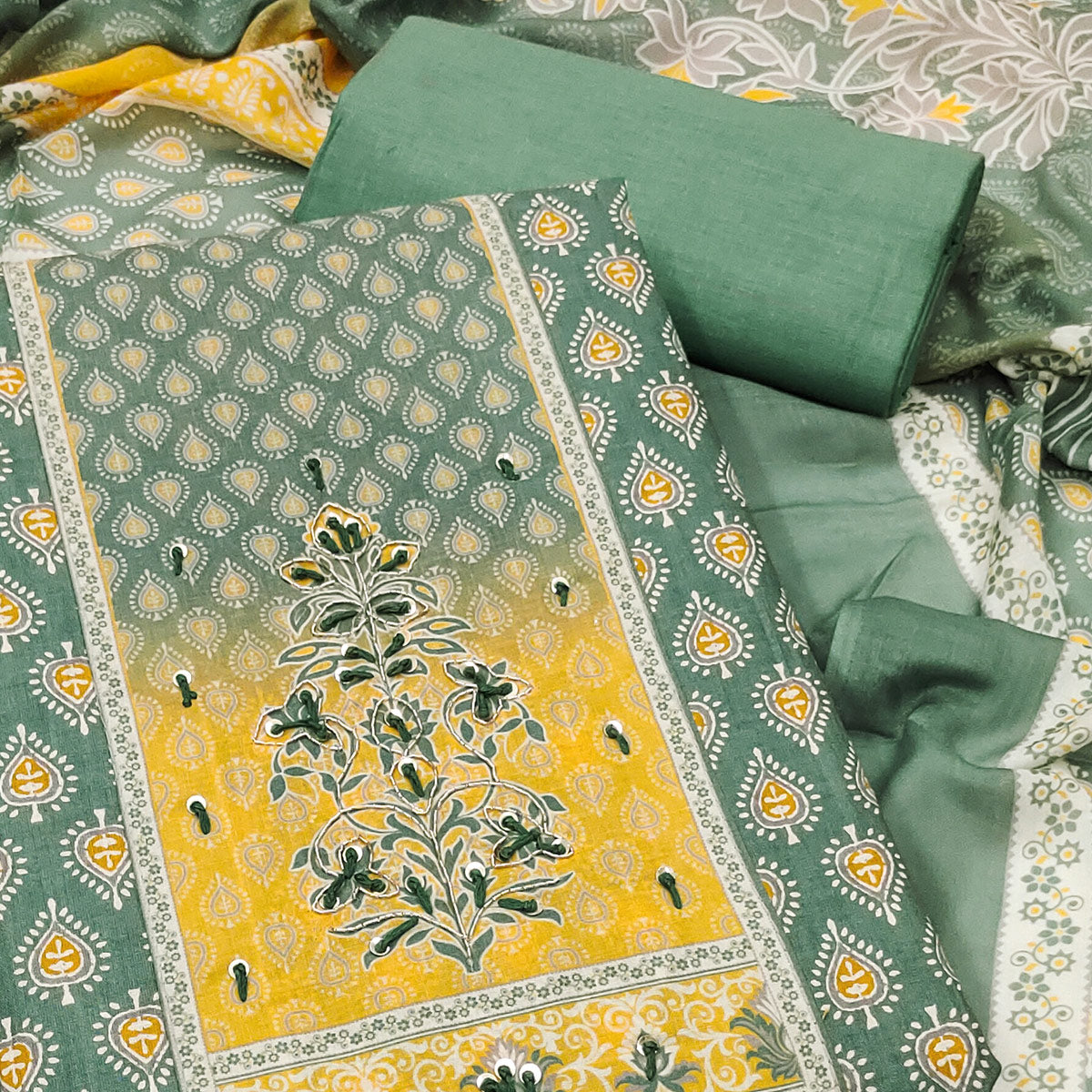 Green Pure Cotton Dress Material Accented With Sparkling Sequin Embroidery Work