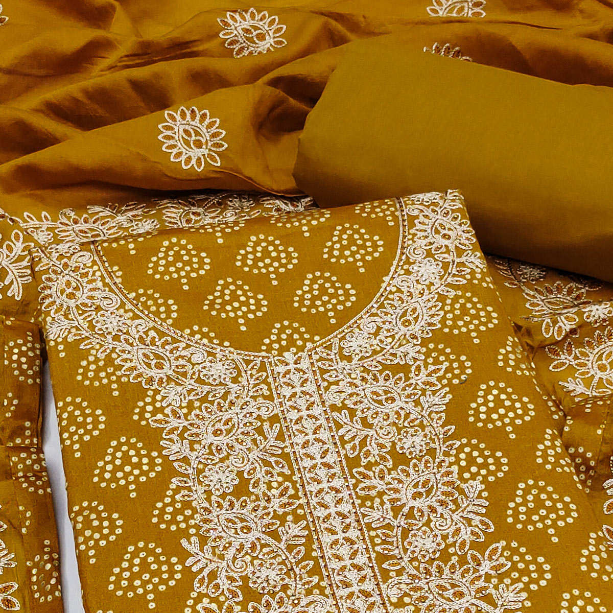 Mustard Bandhani Print Cotton Dress Material Accented with Embroidered Neckline