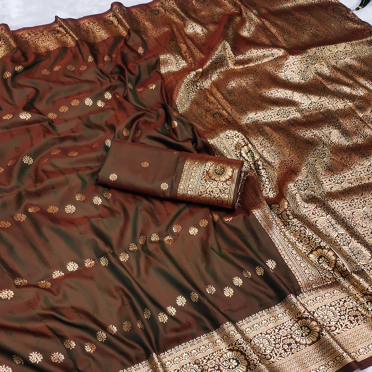 Brown Zari-Woven Cotton Silk Saree Featuring a Graceful Drape and Delicate Tassel Detailing