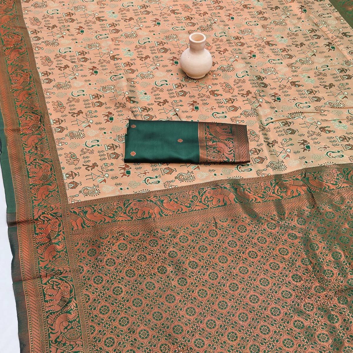 Green Classic Tissue Silk Saree Highlighted with Fine Zari Woven Motifs