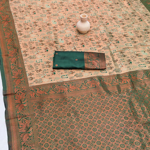 Green Classic Tissue Silk Saree Highlighted with Fine Zari Woven Motifs