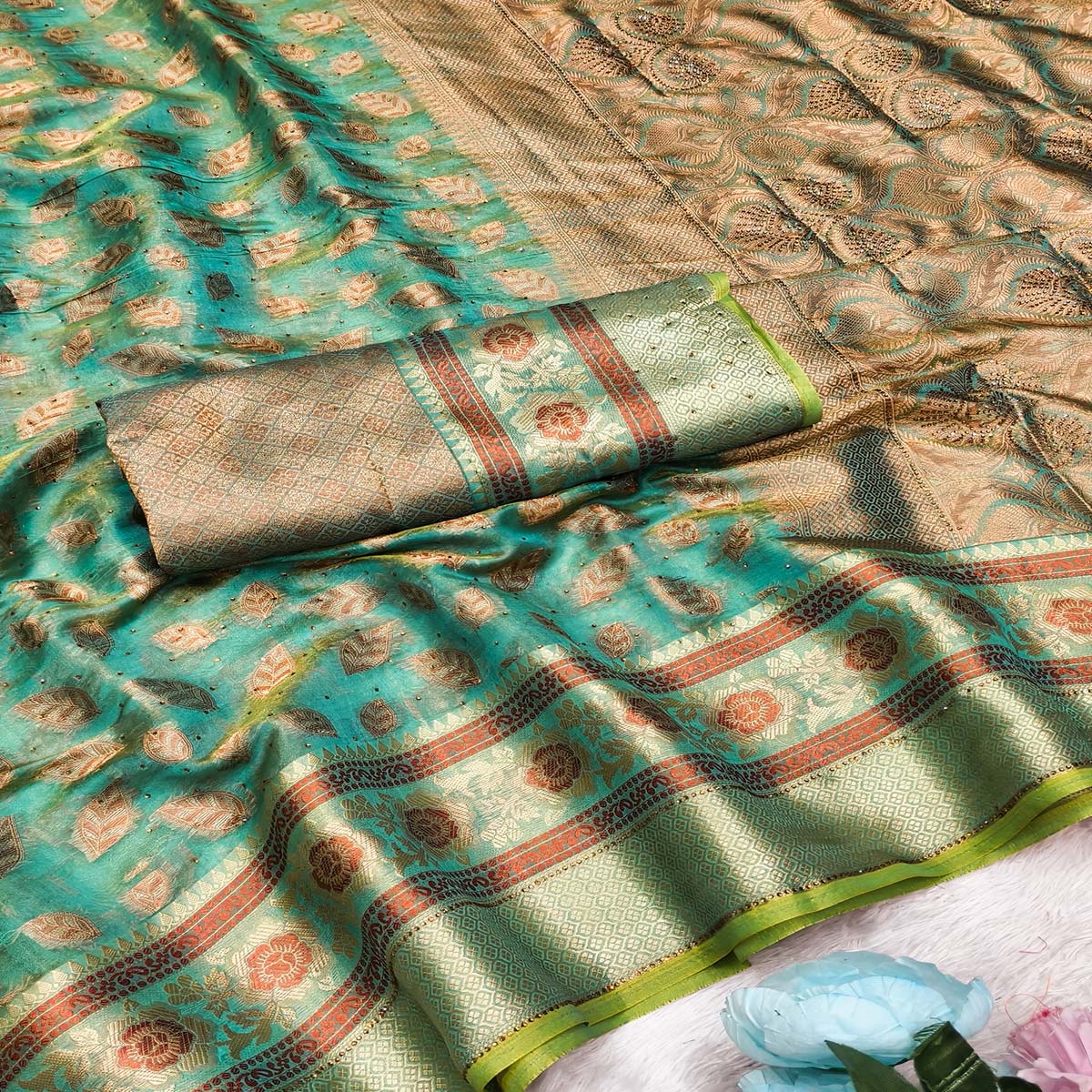 Turquoise Woven Banarasi Crunchy Silk Saree With Leaf & Floral Motifs Accented By Sparkling Stone