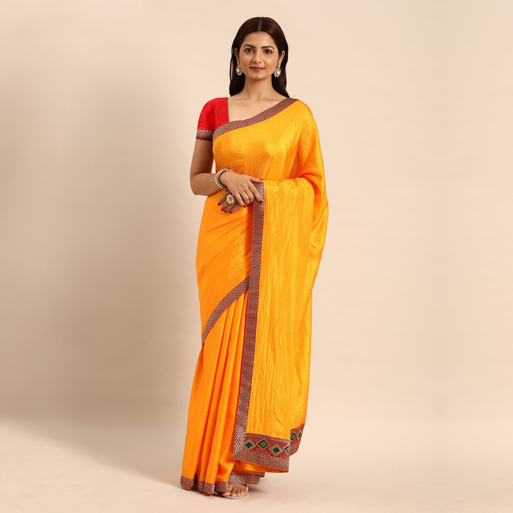 Yellow Solid Vichitra Silk Saree With Fancy Border