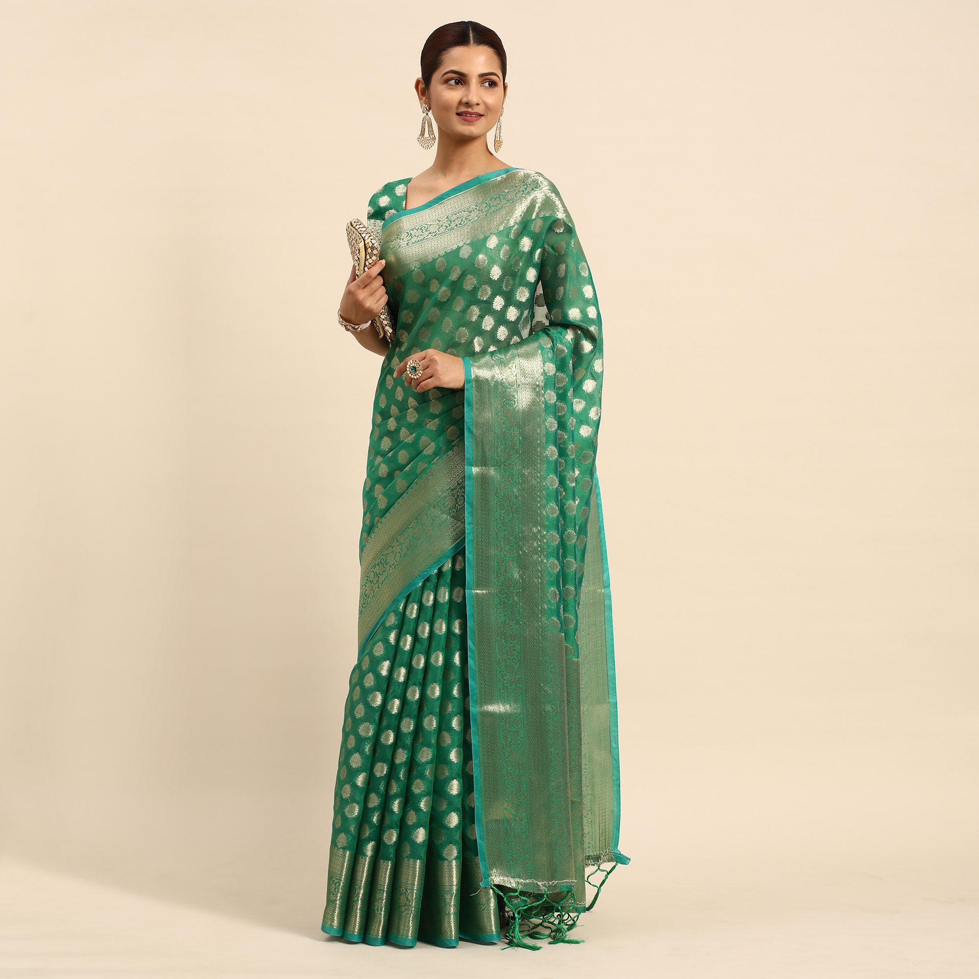 Green Woven Organza Silk Saree With Tassels