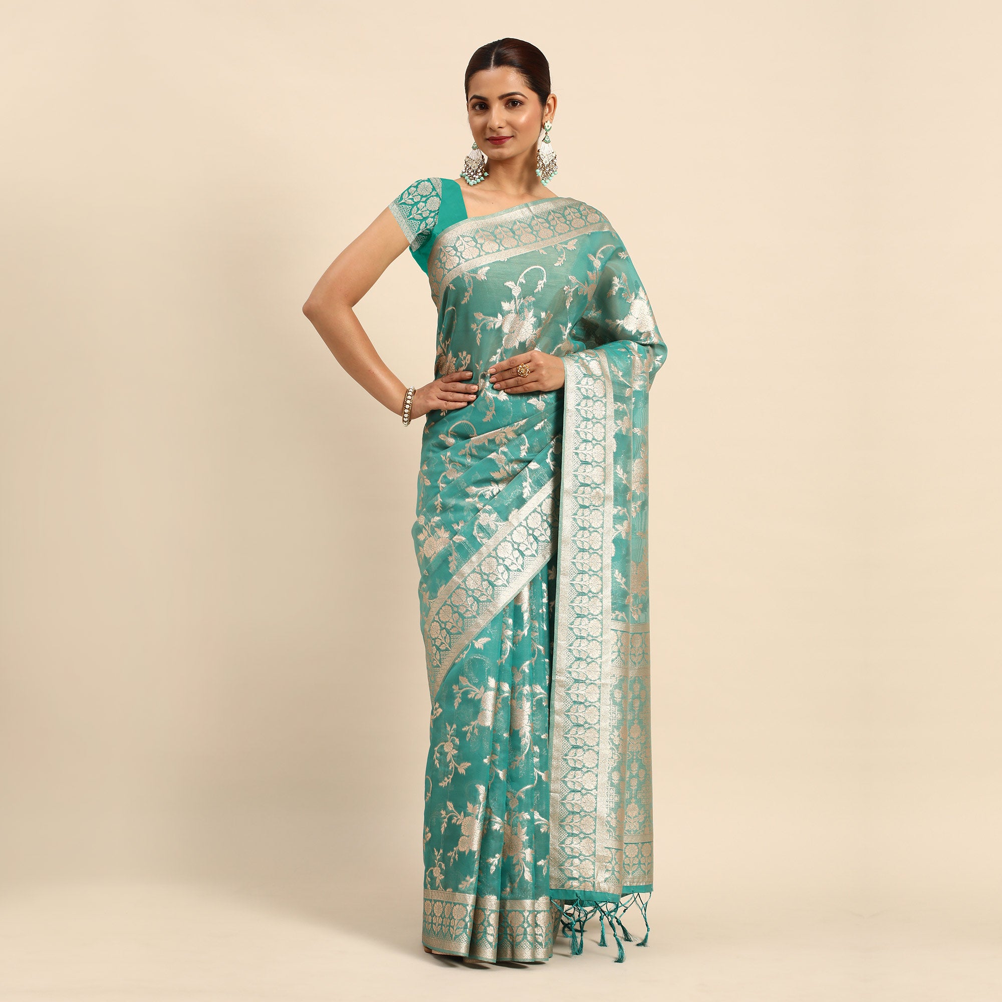 Turquoise Floral Woven Organza Silk Saree With Tassels