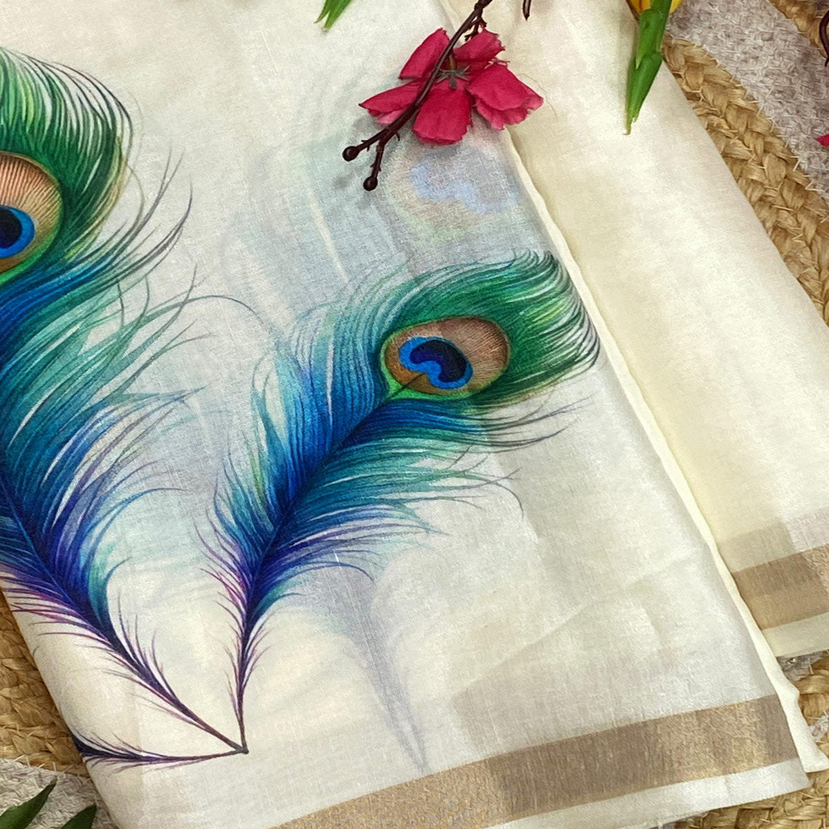 Charming Off White Soft Tussar Cotton Silk Saree with Peacock Feathers Print
