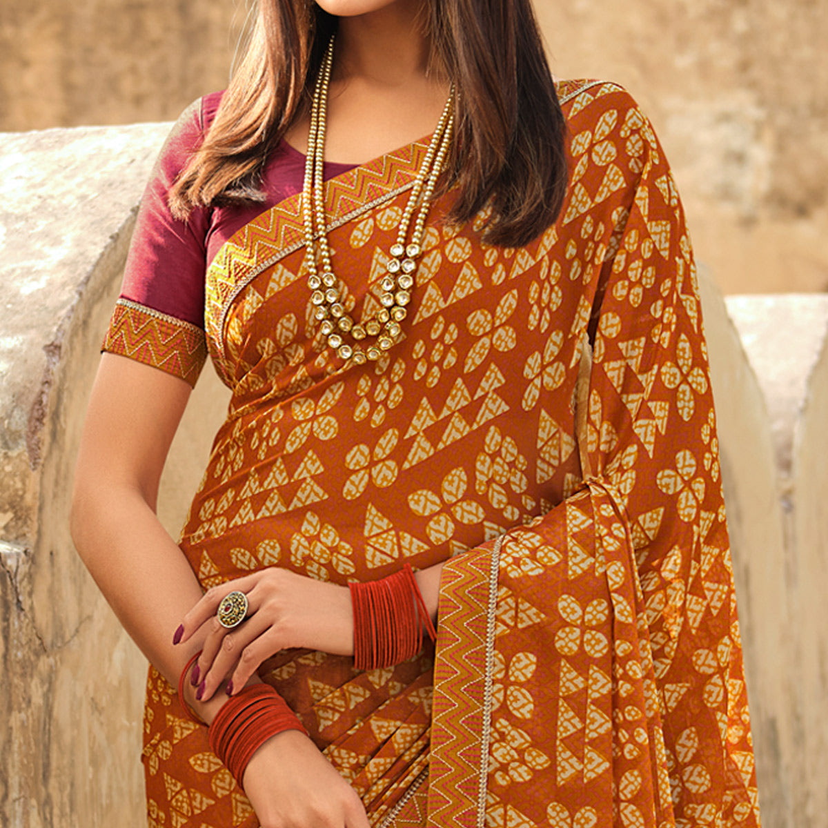 Mustard Printed With Embroidered Border Georgette Saree