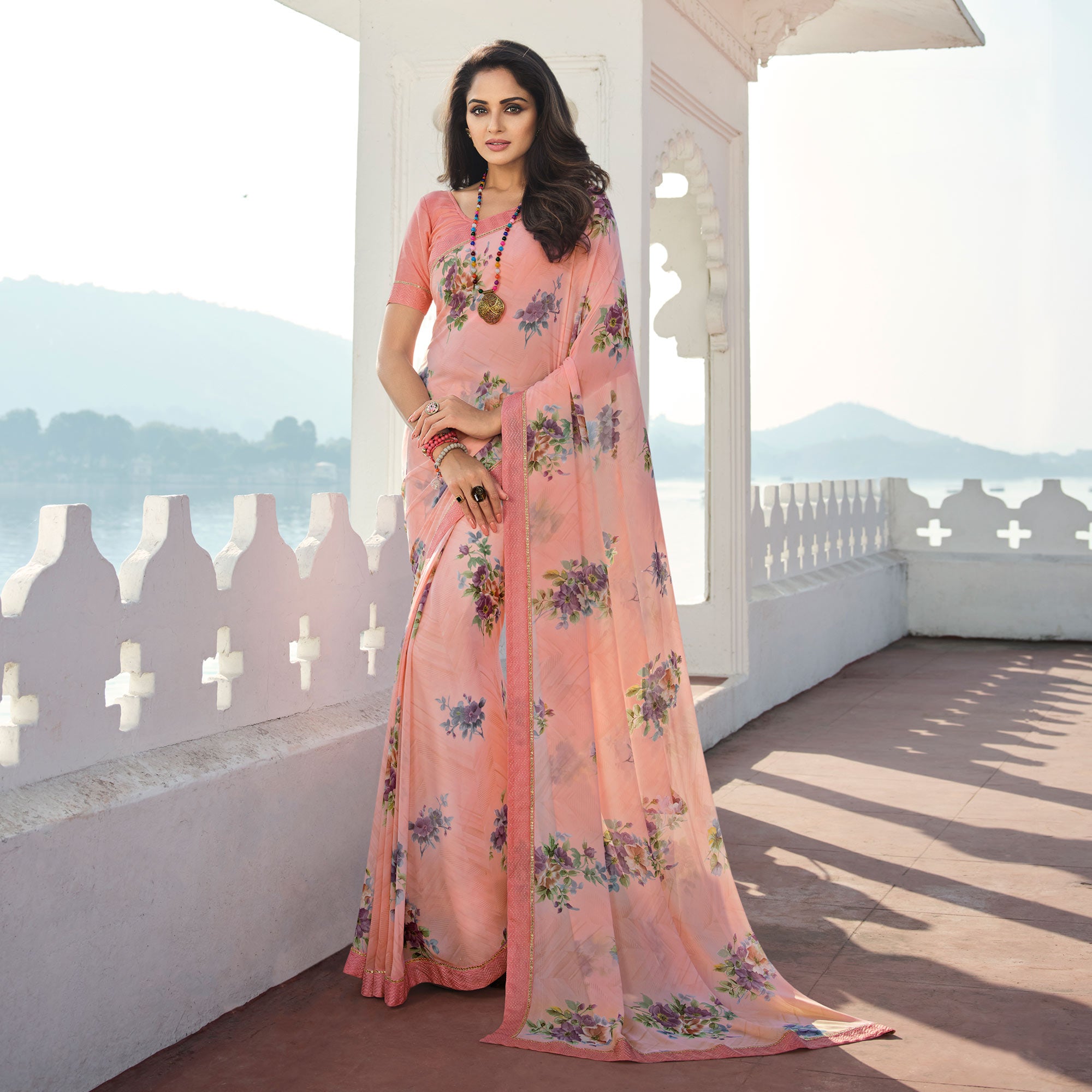 Peach Floral Printed With Embroidered Border Georgette Saree