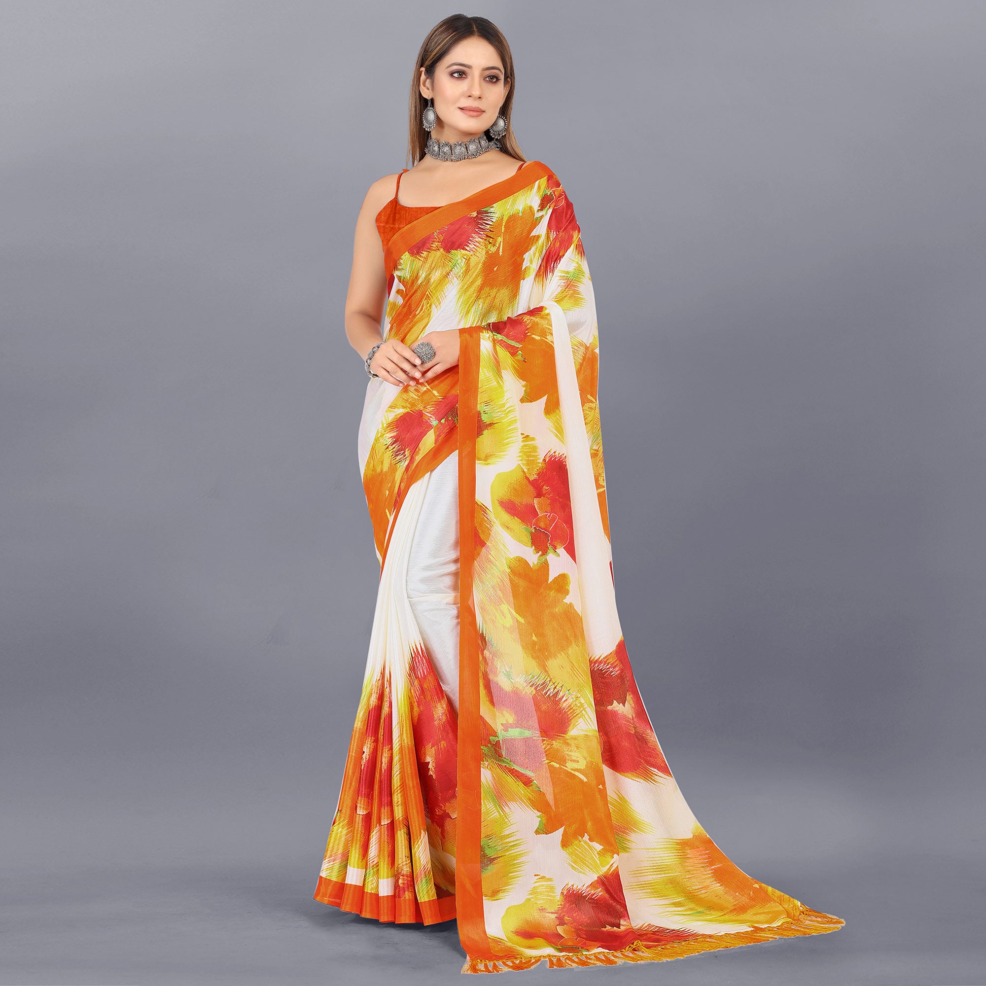 Off White & Orange Foil Printed Chiffon Saree With Tassels