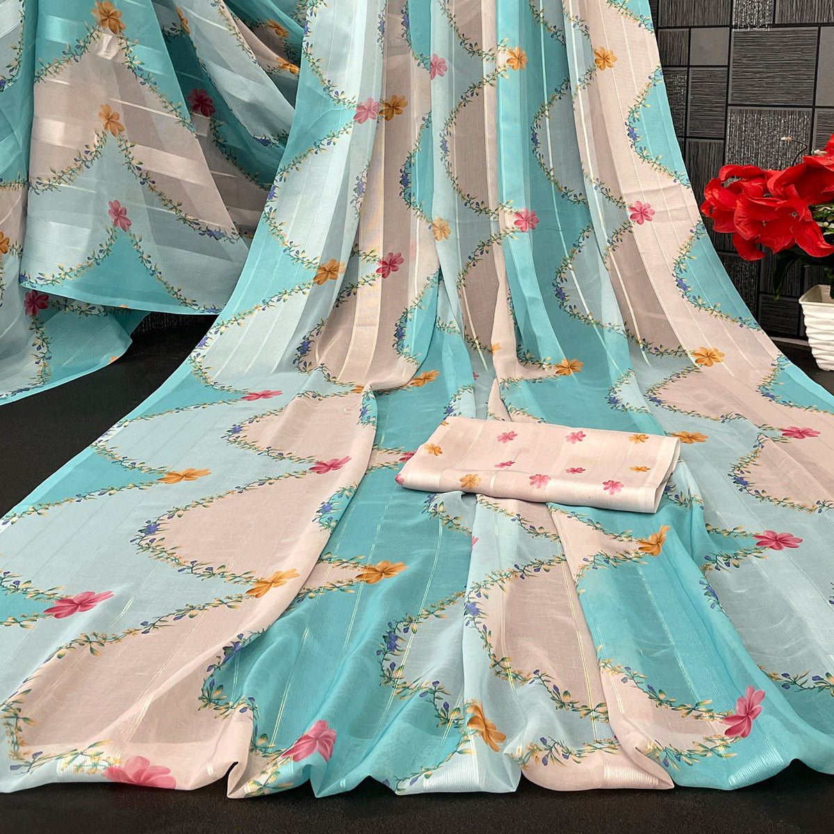 Sky Blue Bloom Floral Digital Printed Georgette Saree Accentuated With Graceful Zari Stripes