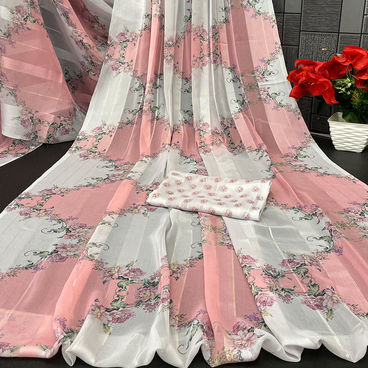 White & Peach Bloom Floral Digital Printed Georgette Saree Accentuated With Graceful Zari Stripes