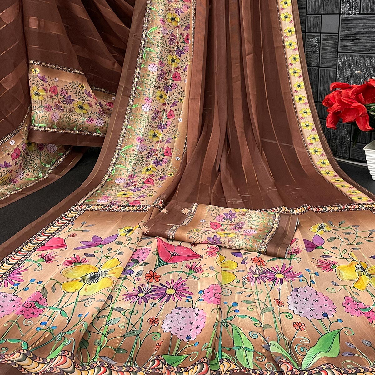Charming Brown Floral Digital Printed Georgette Saree Accentuated With Zari Stripes