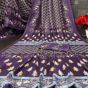 Charming Purple Geometric Digital Printed Georgette Saree Accentuated With Zari Stripes