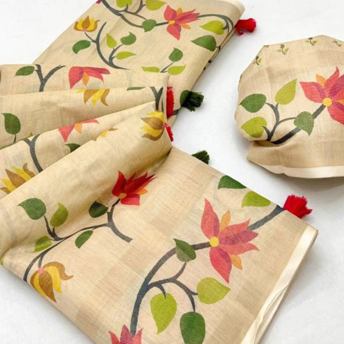 Beige Floral Printed Tissue Cotton Silk Saree Enhanced with a Classic Zari Weaving Border