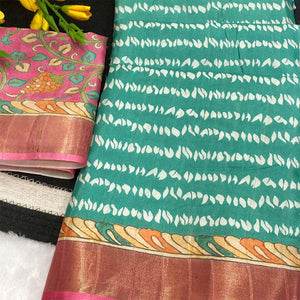 Turquoise Tusser Art Silk Saree Embellished With Peacock Print & Zari Border Work