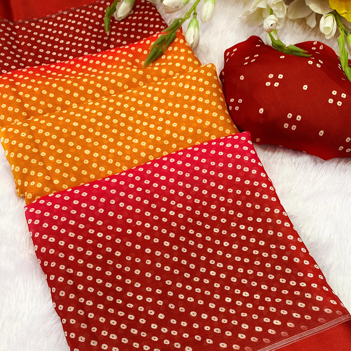 Designer Bandhani Saree in Mustard & Red Crafted from Soft Moss Georgette