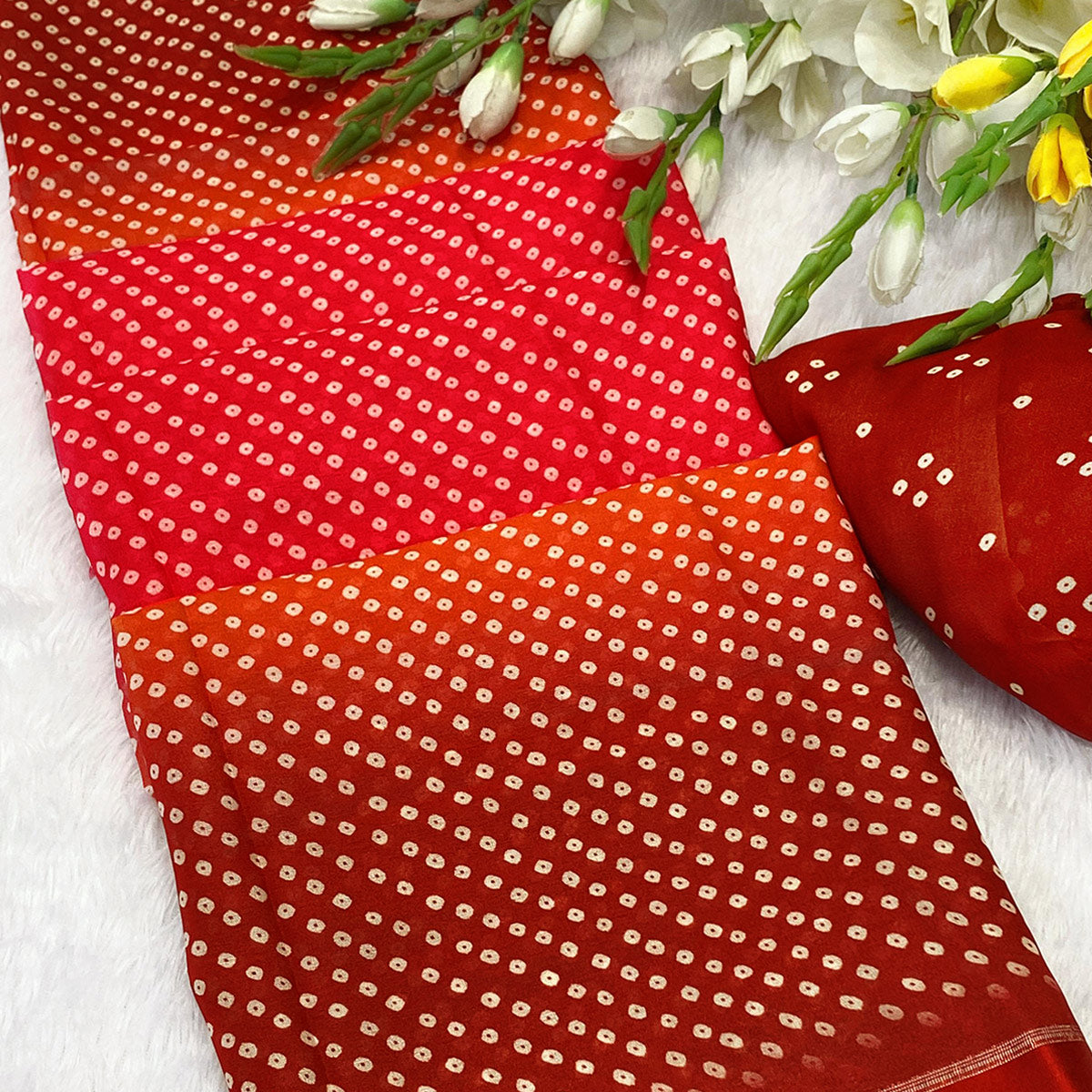 Designer Bandhani Saree in Red Crafted from Soft Moss Georgette