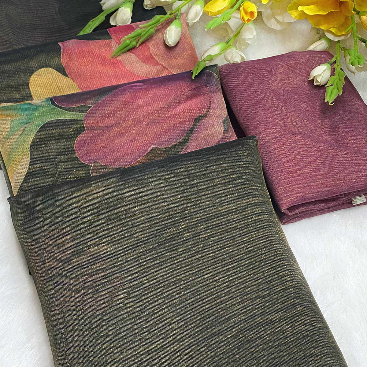 Sophisticated Black Floral Digital Print Tissue Saree Enhanced With Handmade Tassels